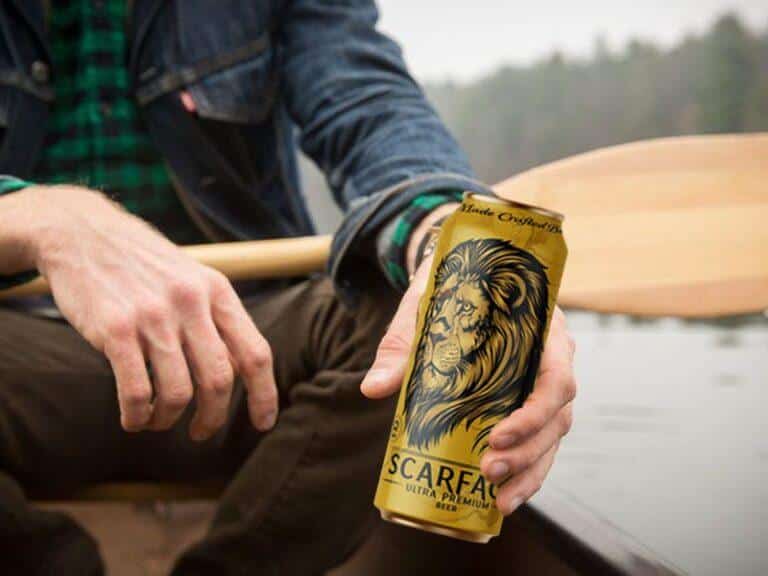 Scarface best strong beer with deep golden color, thick foam head, and chilled condensation, highlighting bold flavor and high alcohol strength.